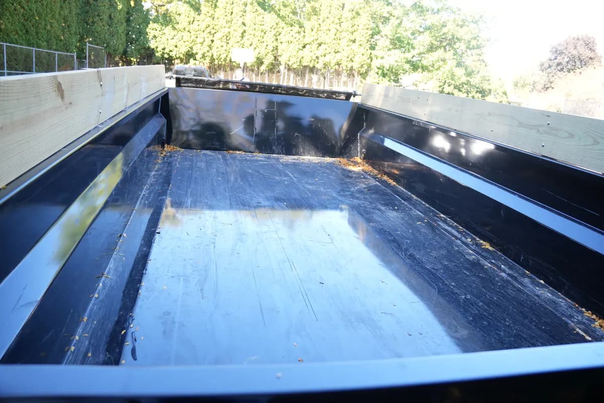 Inside the dump bed of the 2026 PJ DT1162 16' dump trailer